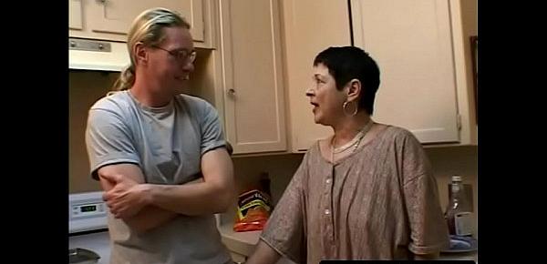  A granny fucked in the kitchen